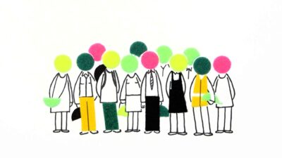 A collection of 12 coloured VELCRO® brand dots arranged to form the heads of a people. The people are dressed in a range of outfits—high vis jacket, suit and pants, black dress—indicating they are from a range of professions.